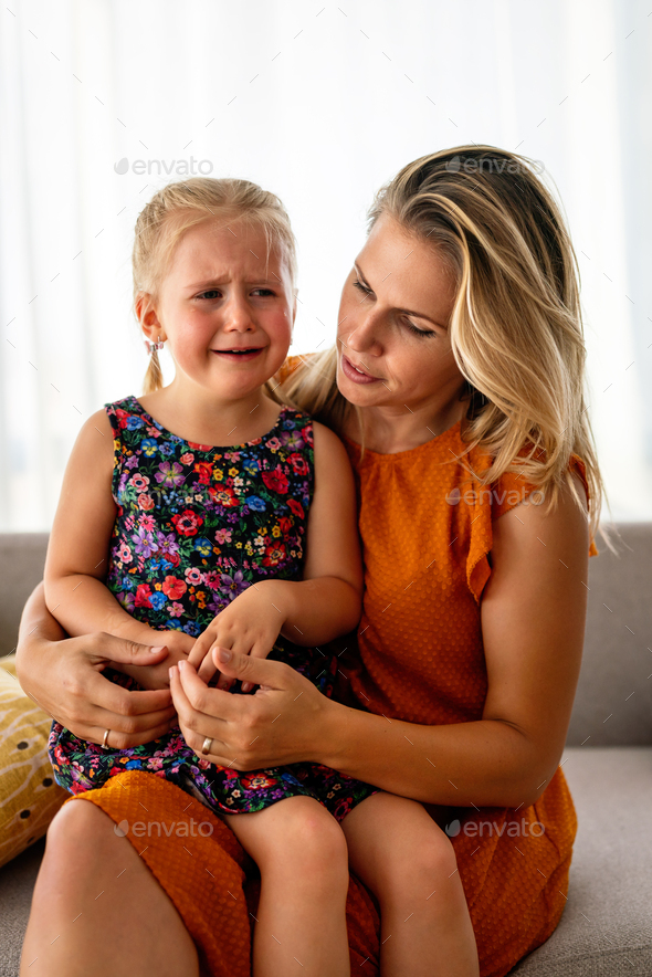 mother-comforting-her-crying-little-girl-parenthood-family-support